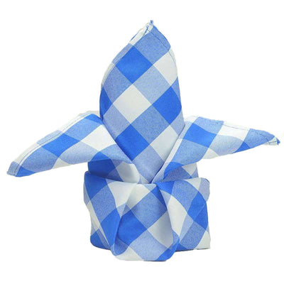 Blue and white checkered napkin folded into a decorative design