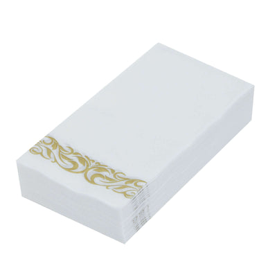 White napkins with gold decorative border, stacked neatly.