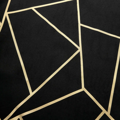 Black fabric with gold geometric pattern design.