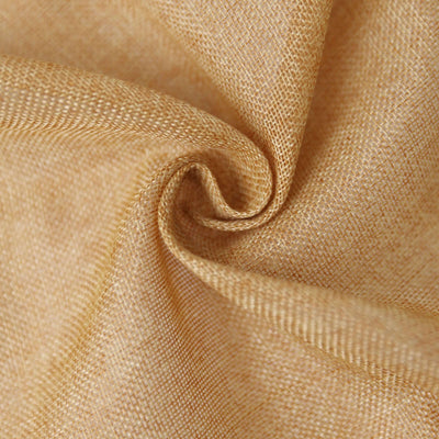 Close-up of textured beige fabric showing intricate weave details.