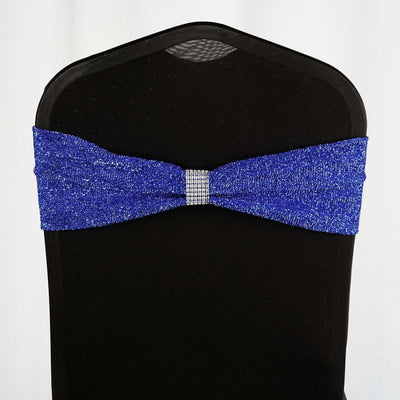 Blue sparkly chair sash with rhinestone detail on a black chair.
