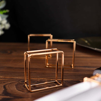 Gold geometric decor accents on a wooden table.