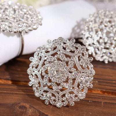 Elegant silver brooch adorned with sparkling crystals.