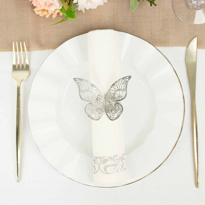 Decorative butterfly plate with a napkin on a dining table setting.