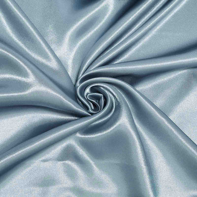 Silky blue fabric with a smooth texture, showcasing a spiral pattern.