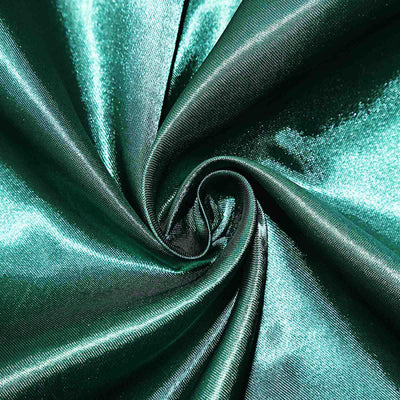 Emerald green satin fabric with a smooth, shiny texture.