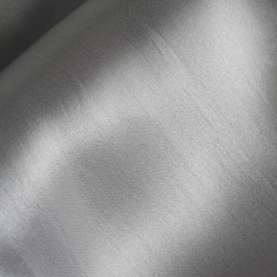 Silver satin fabric texture, smooth and shiny.
