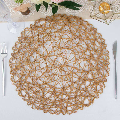 Natural woven round placemat on a table setting.