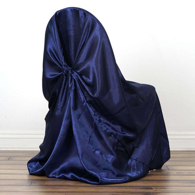 Navy blue satin chair cover draped elegantly over a chair