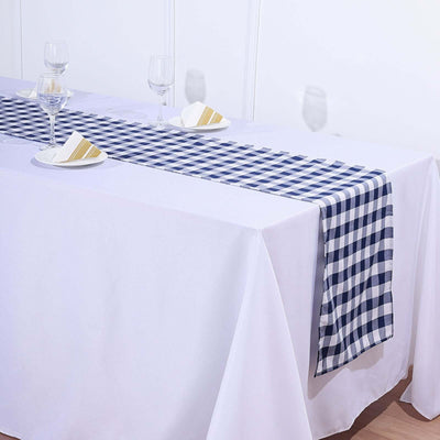 Navy and white checkered table runner on a white table