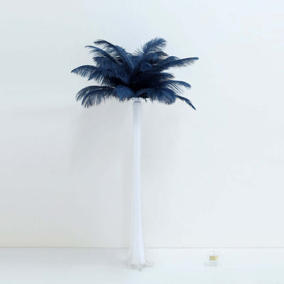 Navy feather palm tree decoration on a white background