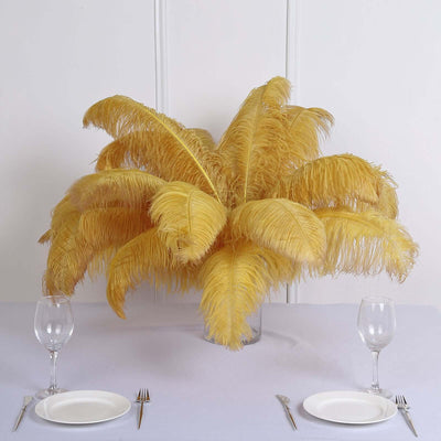 Yellow feather centerpiece arrangement for elegant dining table decor.