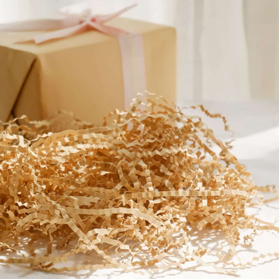 Brown crinkle paper filler for gift packaging and decoration.