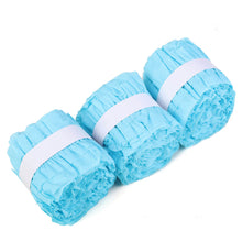 Three rolls of blue ruffled tissue paper with white ribbons balloon & décor garlands