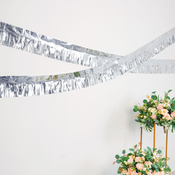 Enhance Your Party Decor with the Metallic Silver Foil Tassel Fringe Backdrop Banner