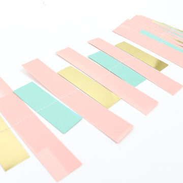 Create a Magical Atmosphere with the Gold, Blush, and Turquoise Confetti-Like Paper Party Garland Streamer