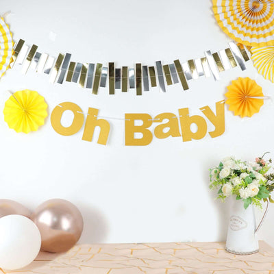 Decorative "Oh Baby" banner with yellow and silver accents for celebrations.