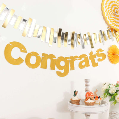 Gold "Congrats" banner decoration for celebrations and parties.