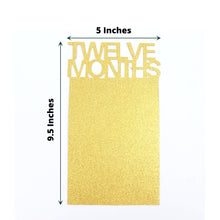 Gold paper card with twelve months milestone