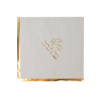 Elegant white invitation with gold foil accents and scales design.