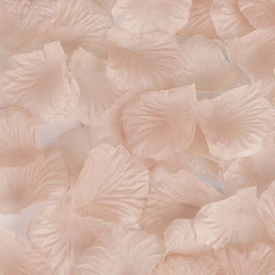 Silk rose petals in soft pink, perfect for decorations and events.