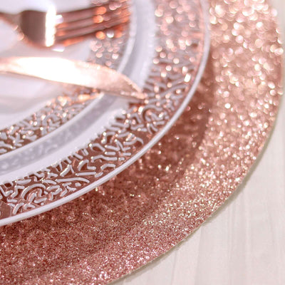 Rose gold glitter placemat with decorative white plate and cutlery.