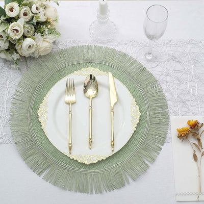 Elegant green fringed placemat with gold cutlery and white plate