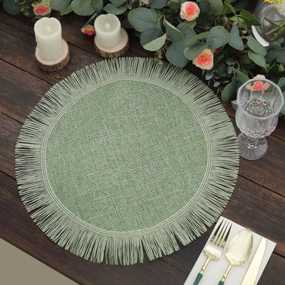 Green woven placemat with fringe detail on a rustic wooden table.