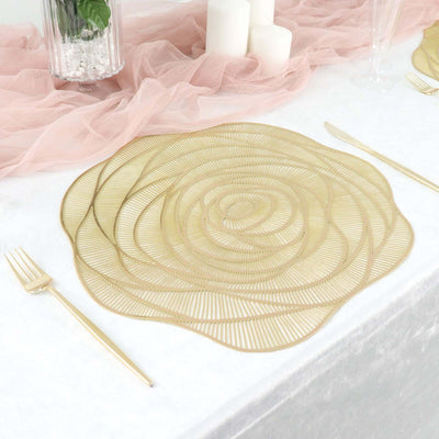 Gold spiral placemat on a styled table with decorative elements.