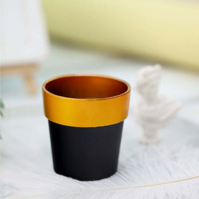 Black and gold decorative plant pot