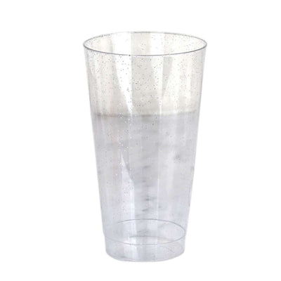 Clear plastic cup with silver sparkles, perfect for parties or events.