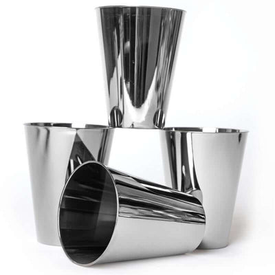 Shiny stainless steel cups stacked in a stylish arrangement.