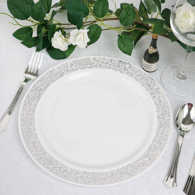 Elegant white dinner plate with intricate silver design