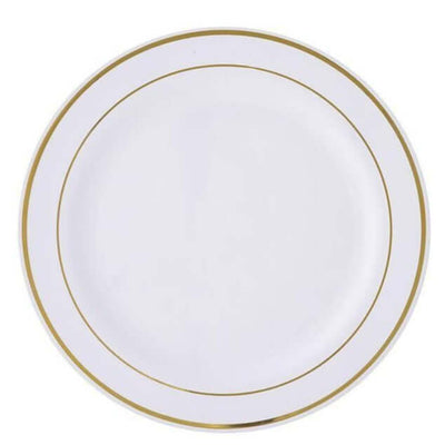 Elegant white plate with gold rim design.