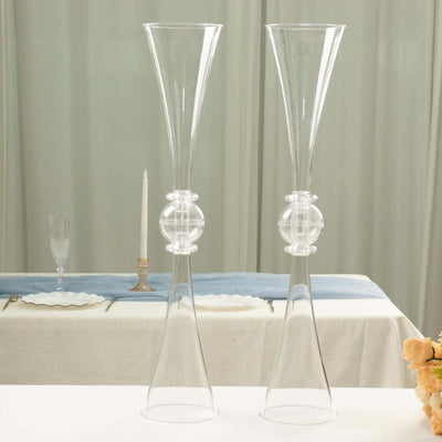 Elegant glass candle holders with a unique design, perfect for home decor.