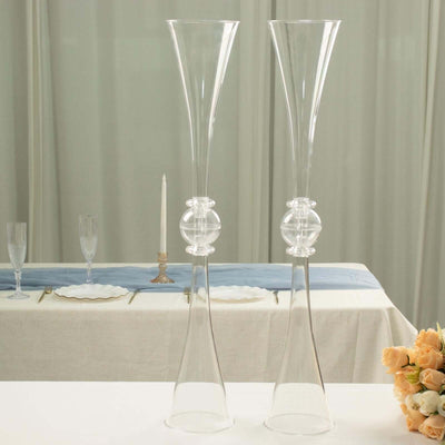 Elegant glass vases with unique design for floral arrangements.