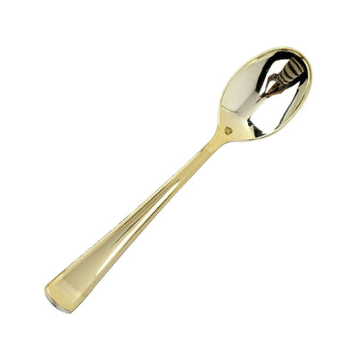 Gold stainless steel spoon on white background