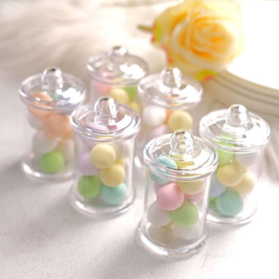 Colorful candy-filled jars for festive decor or party favors.