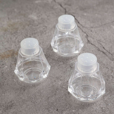 Clear plastic condiment containers set, stylish and functional.