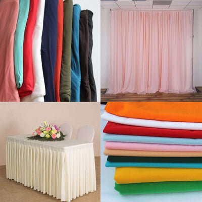 Variety of fabric colors, drapes, and table coverings for events and decor.