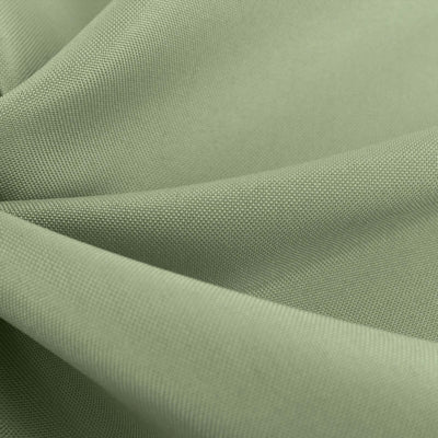 Textured green fabric close-up showcasing soft, woven details.