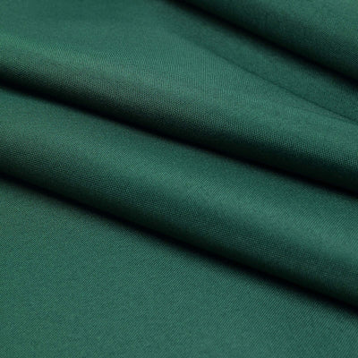 Green fabric with folded texture and smooth finish.