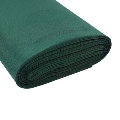 Dark green fabric roll on a white background.