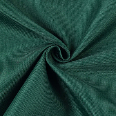 Green fabric texture close-up showcasing a smooth, woven pattern.