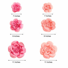 Floral backdrop décor - different sizes of pink paper flowers