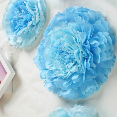 Blue paper flower decorations on a soft white background