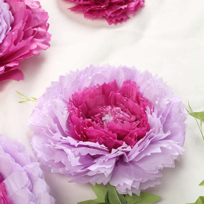 Purple and pink paper flower decoration with green leaves.