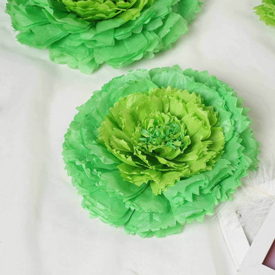 Green paper flower decoration on a white background.