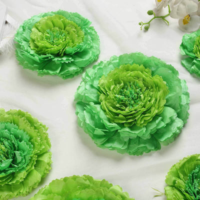 Green floral decorations arranged on a white surface for decor inspiration.