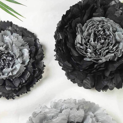 Black and gray decorative paper flowers in various sizes